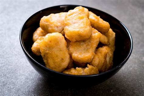 Chicken nuggets with sauce stock photo. Image of isolated - 146376914