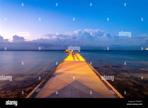 Dawn from the Higgs Beach Pier Stock Photo - Alamy