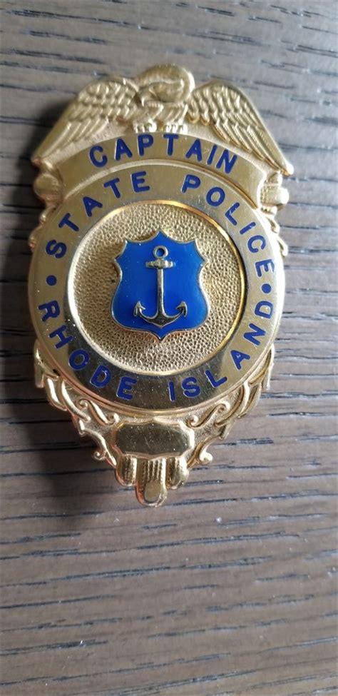 Collectors-Badges Auctions - Rhode Island State Police Captain Shield