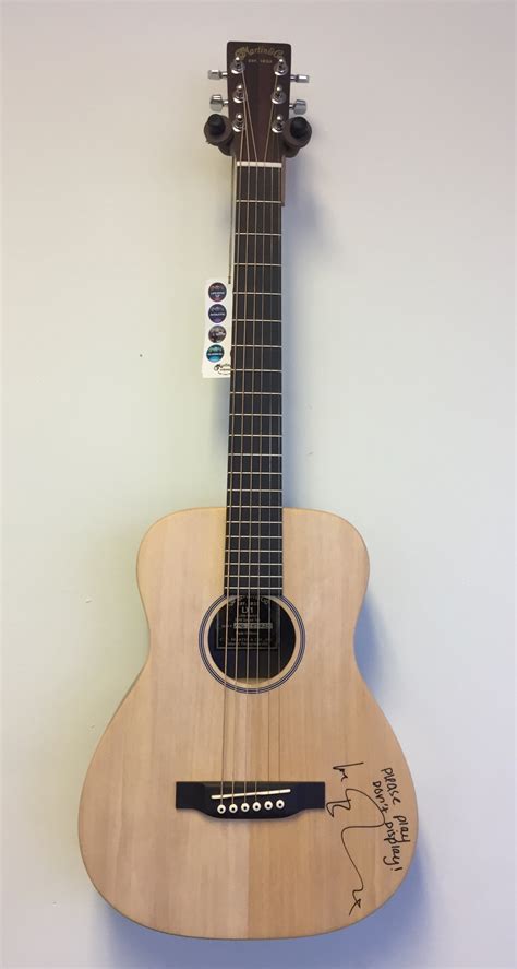 Charitybuzz: Ed Sheeran Signed Acoustic Guitar - Lot 1505502