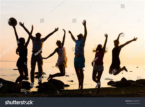 Happy Friends Having Party On Beach Stock Photo 654489061 | Shutterstock