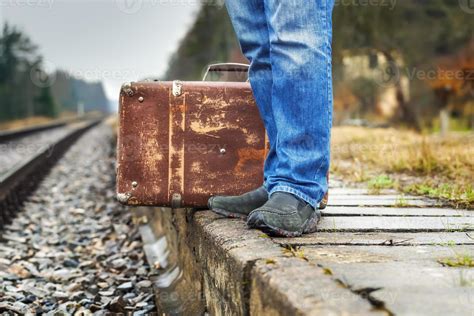 Man with a suitcase 1387002 Stock Photo at Vecteezy