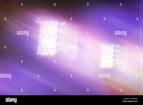 LED video and photography light on light stand in blurred background ...