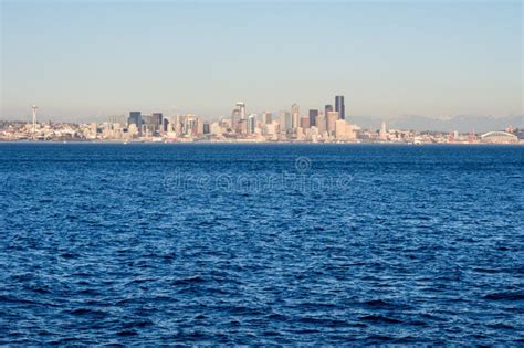 View of Seattle Waterfront from the Sea at Sunset Stock Image - Image ...