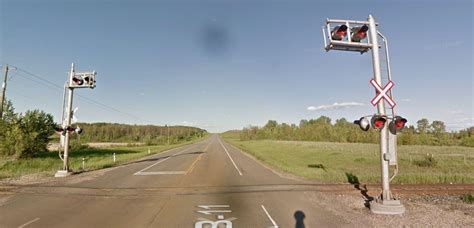 Mini railroad crossing near Ardley, Alberta on the David Thompson ...