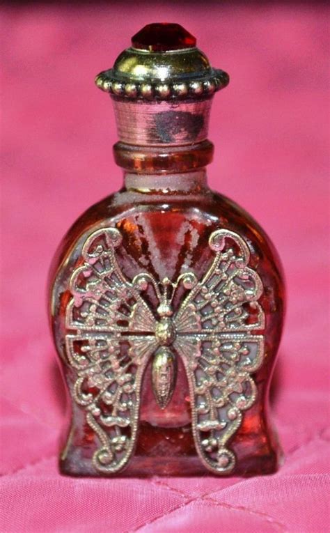 Perfume Bottle Filigree Butterfly Decoration | Glass perfume bottle, Perfume bottles, Antique ...
