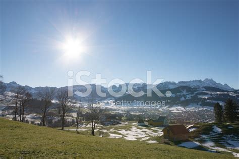 Switzerland, Appenzell Winter Against The Sun Stock Photo | Royalty ...