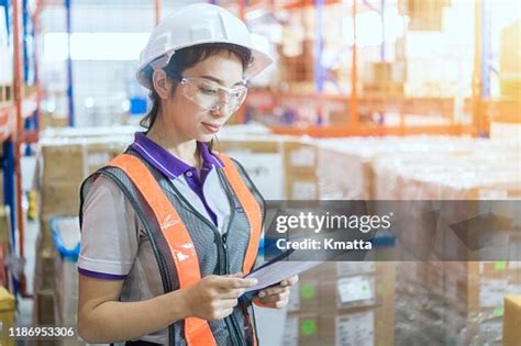 Warehouse Worker With Safety Work Wear High-Res Stock Photo - Getty Images