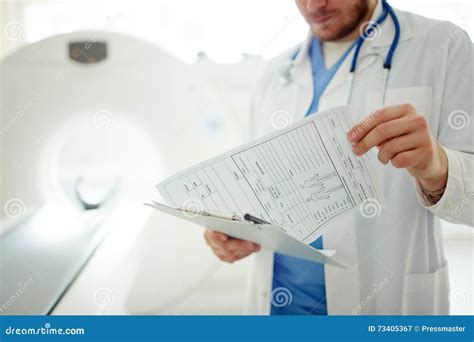 Preparation for CT scan stock image. Image of document - 73405367