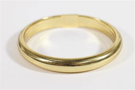 14K ITALIAN GOLD BANGLE BRACELET - Oct 13, 2018 | Vero Beach Auction in FL