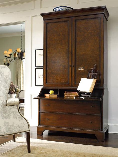 Secretary Desk This piece of office furniture is made of a wide base of ...