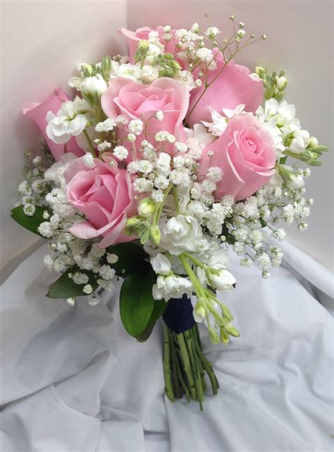 Bridal Bouquet with pink Roses white mini-carnations and Baby's Breath #weddingbouquets Prom ...