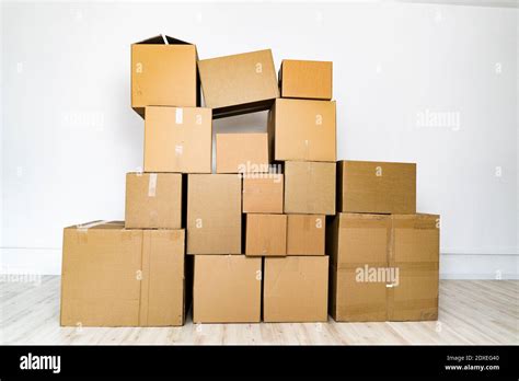 Domestic room filled with cardboard boxes Stock Photo - Alamy