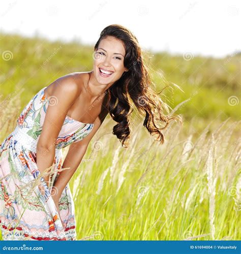 Young Beautiful Smiling Woman Outdoors Stock Photo - Image of long, happiness: 61694004