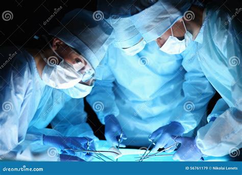 Team Surgeon at Work in Operating Room Stock Image - Image of clinical, healthcare: 56761179