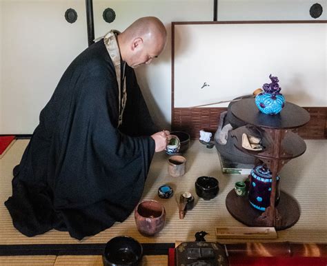 A traditional tea ceremony with centuries-old creamics and tea cups ...