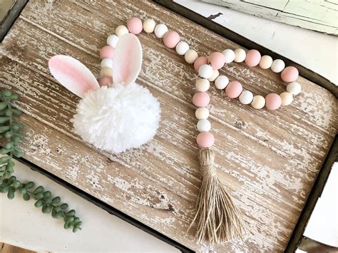 Pom Pom Easter Bunny Wood Bead Garland | Etsy | Wood bead garland, Wood ...