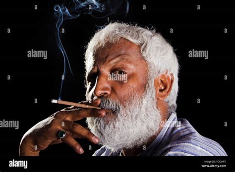 1 indian Senior Adult Man Smoking Cigarette Stock Photo - Alamy