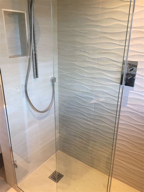 Wave feature tile | Bathroom shower walls, Small bathroom remodel ...