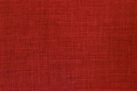 Premium Photo | Dark red linen fabric texture with seamless pattern.