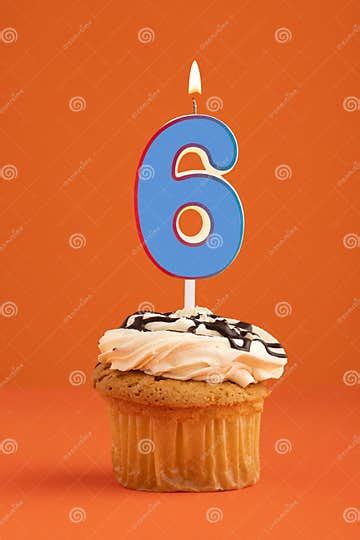 Blue Number 6 Candle - Birthday Cake on Orange Background Stock Photo ...