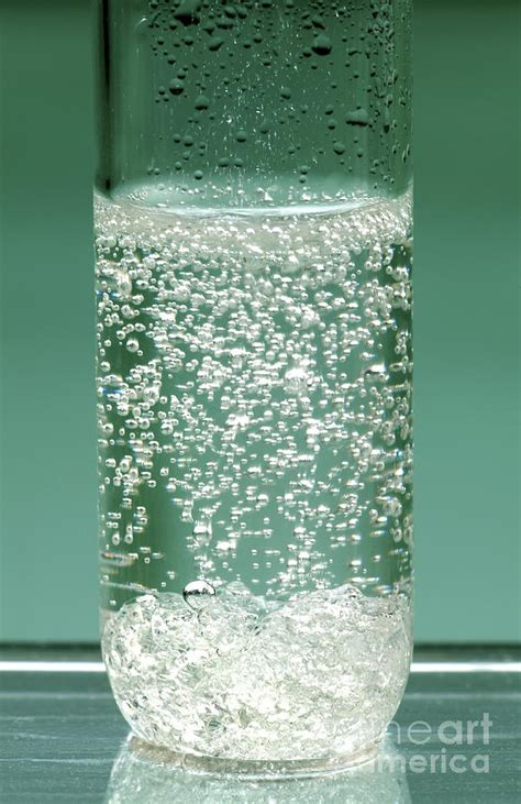 Reaction Of Sodium Carbonate In Acid Photograph by Martyn F. Chillmaid