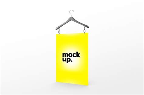 Premium PSD | A yellow poster hanging on a hanger that says mock up.