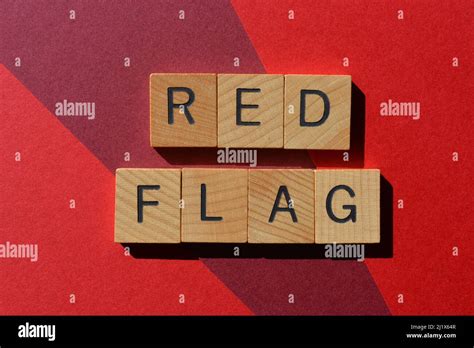 Red Flag, words in wooden alphabet letters isolated on red background ...