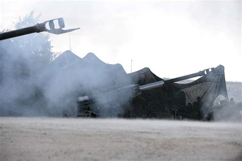 Smoke from an M777 Howitzer fills the air after firing - NARA & DVIDS ...