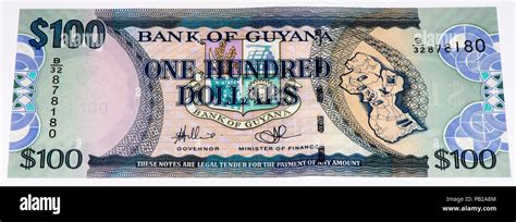 100 Guyanese dollars bank note. Guyanese dollar is the national ...