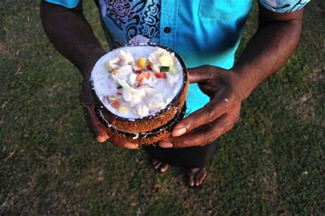 Indigenous Fijian Man Serves Fijian Food Kokoda Stock Photo - Download ...