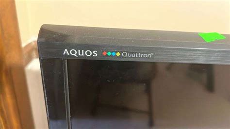 Sharp Quattron Aquos TV with remote 70” - Metzger Property Services LLC