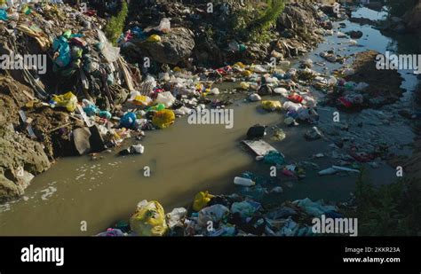 Water pollution. Aerial view of horrific plastic pollution in rivers in Africa Stock Video ...