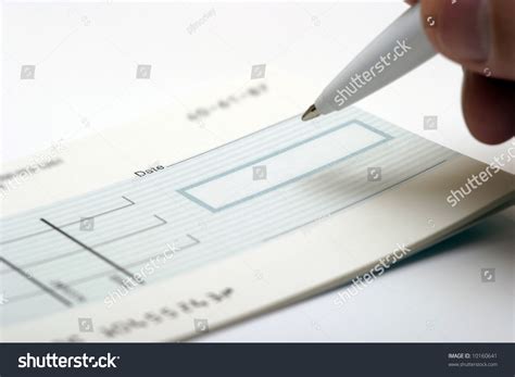 A Generic Blank Check Being Signed Stock Photo 10160641 : Shutterstock