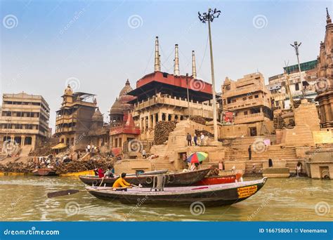 Boats Going by the Cremation Ghat in Varanasi Editorial Photo - Image ...