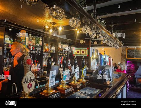 Interior of a traditional English pub Stock Photo - Alamy