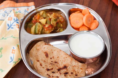 Dinner Meal Plate:Tawa Paratha,Aloo Turai Subzi,Curd & Salad by Archana ...