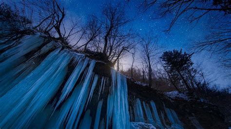 Frozen waterfall icicles at night with stars, Matsumoto, Nagano, Japan ...