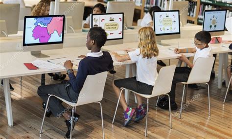 Children using computers at school Stock Photo by ©Rawpixel 112781164