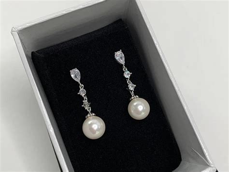 Share 152+ long pearl drop earrings bridal super hot - seven.edu.vn