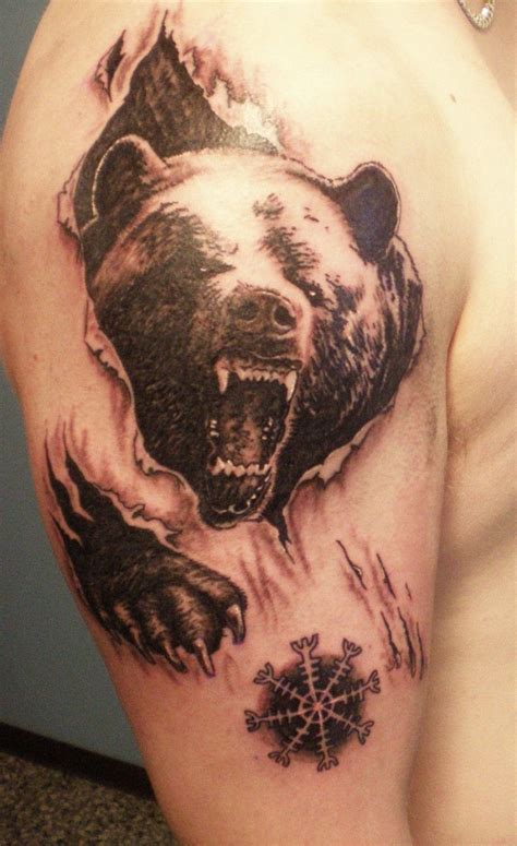 Angry bear skin rip tattoo on shoulder - Bear Tattoos | Bear tattoos, Bear tattoo designs ...