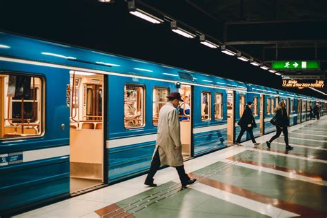 Metro station with passengers on platform · Free Stock Photo