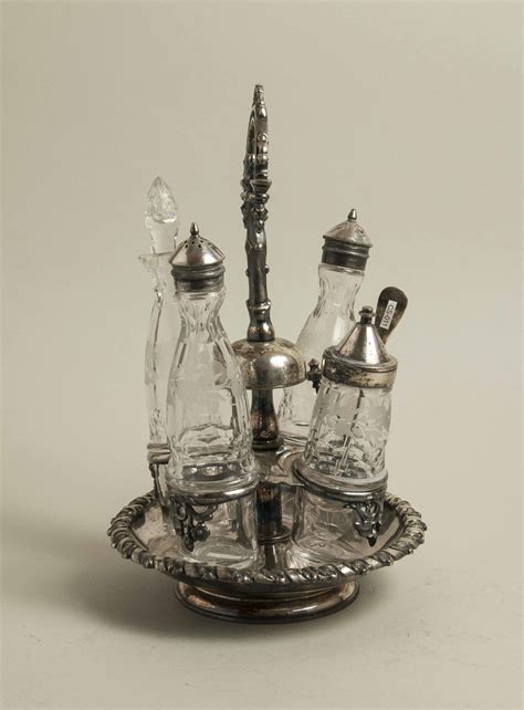 Glass Cruet Set with Bell | Witherell's Auction House