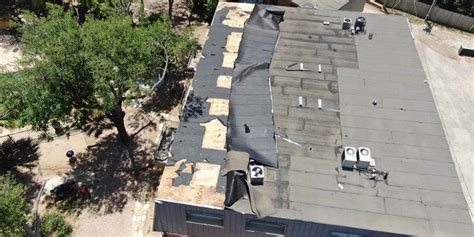 Roof Wind Damage: Identification Guide (With Pictures)