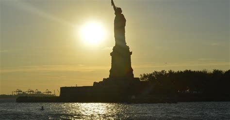 New York City: Sunset Boat Cruise to Statue of Liberty | GetYourGuide