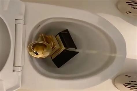 Kanye West Posts Video of Himself Peeing on Grammy Award - XXL