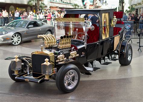 56 Halloweens ago, "The Munsters" had the ghoulest cars on the block ...