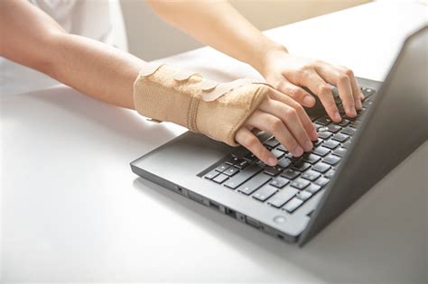 Wrist Pain From Using Computer Office Syndrome Hand Pain Or Injury Woman Use Elastic Bandage To ...