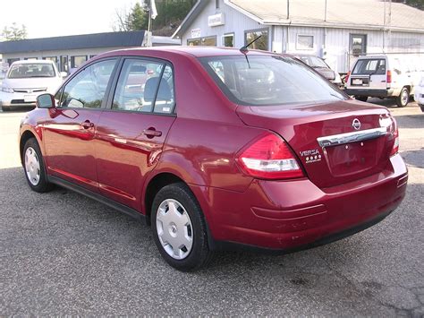 Earthy Cars Blog: EARTHY CAR OF THE WEEK: Red 2009 Nissan Versa 1.8S Sedan