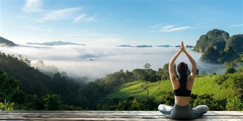 Woman Practicing Yoga at Mountain Peak Cliff Edge Stock Image - Image ...